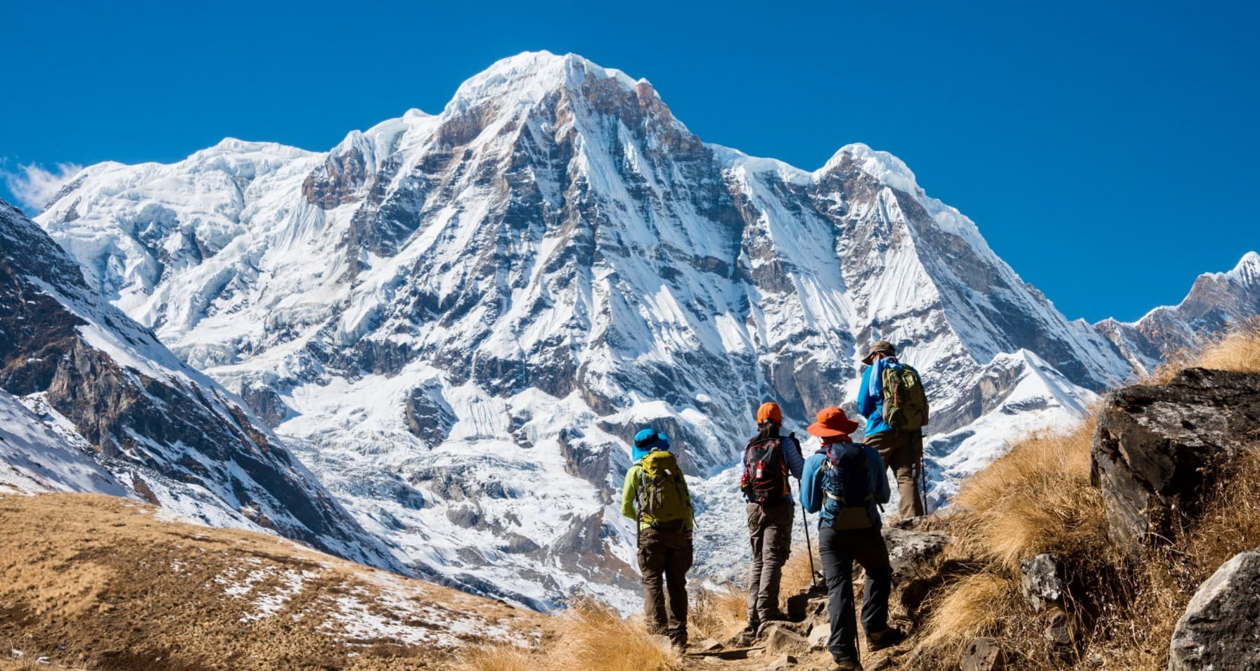 Trekking In Annapurna Region With Annapurna South In Background Scaled