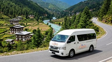 Van driving scenic highway Paro 202607052043