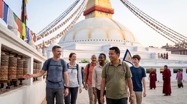 Travelers walking Boudhanath Stu… 2K 202607050936