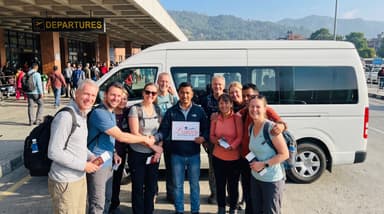 Travelers and guide group photo 202607051233