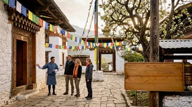 Travelers exploring Bhutan templ… 202607052120