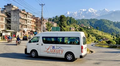 Transfer van driving toward Naga… 202607052128