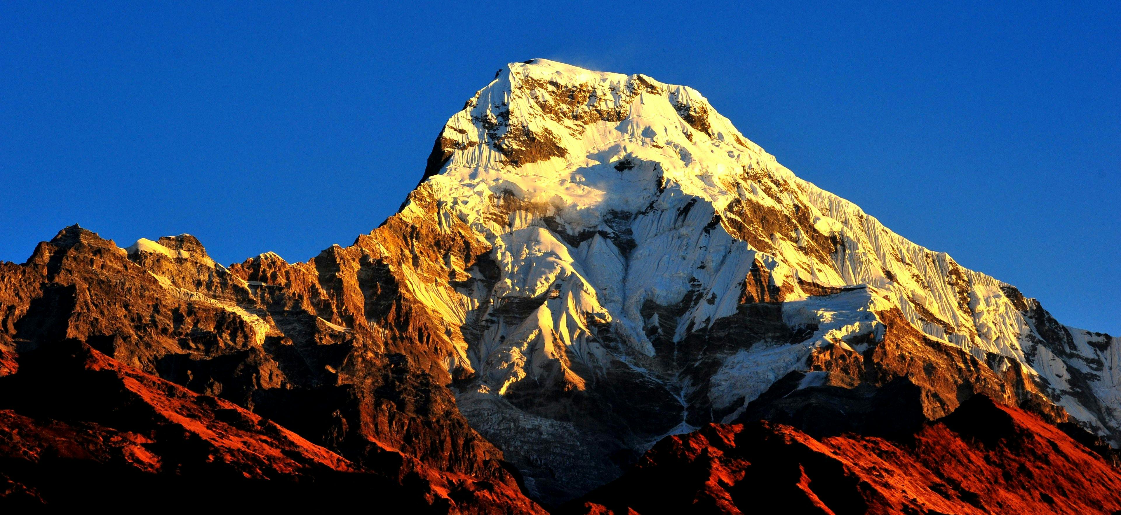 Which is the least-climbed 8000-meter Peak in Nepal?